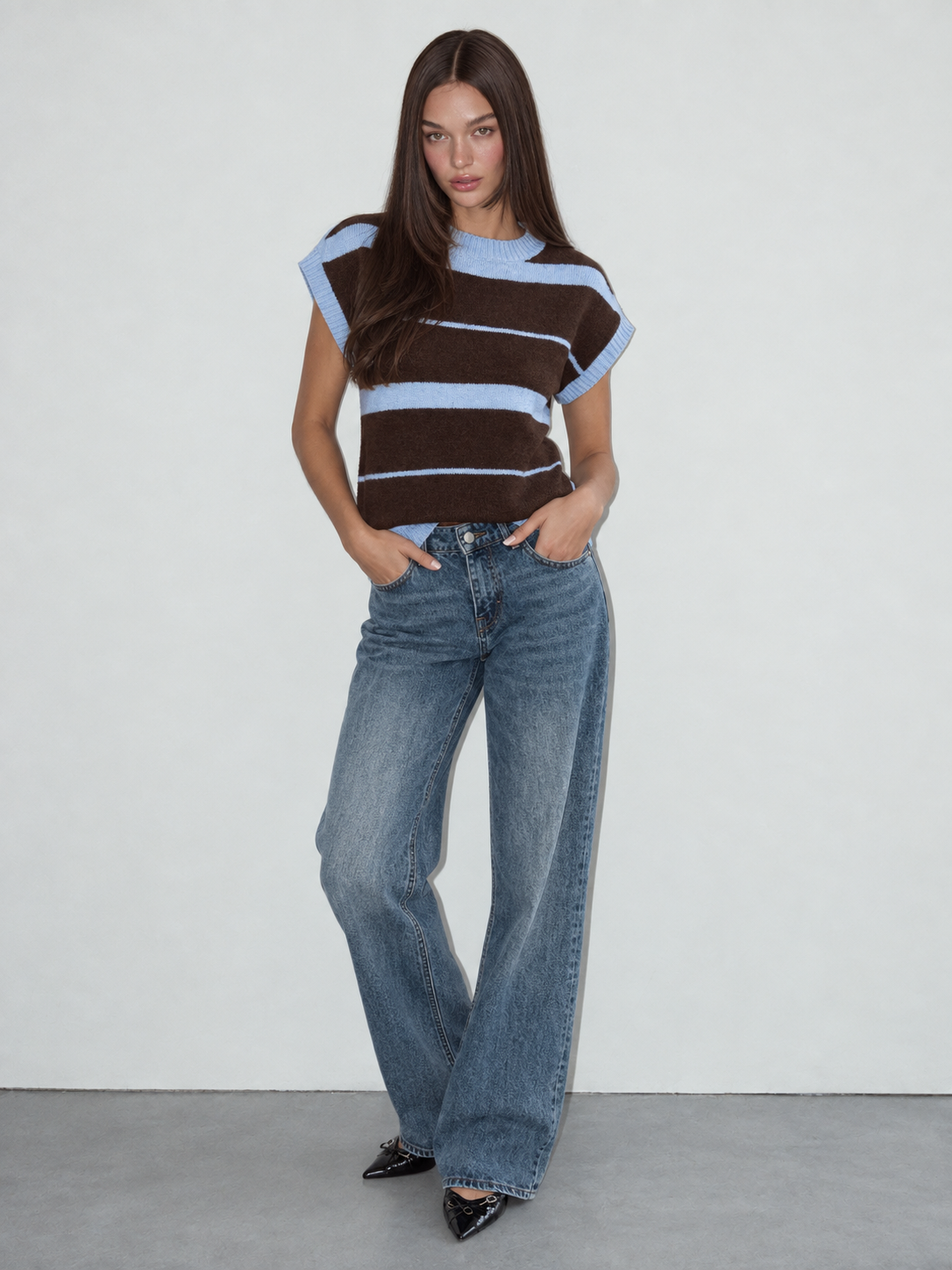 Mouwloze trui blauw bruin
