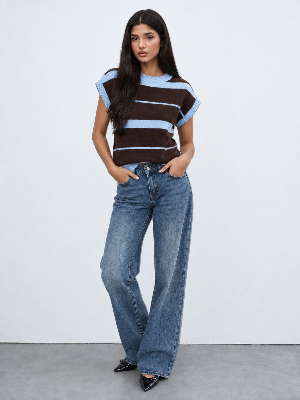 Mouwloze trui blauw bruin